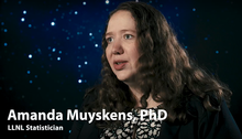 Amanda in front of a starry backdrop with her name and job title in text overlay