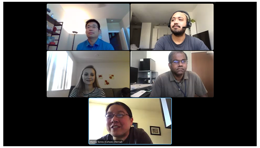 the panelists and host in video chat on a black background