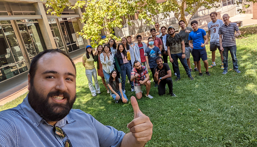 Vagelis taking a selfie with the students behind him