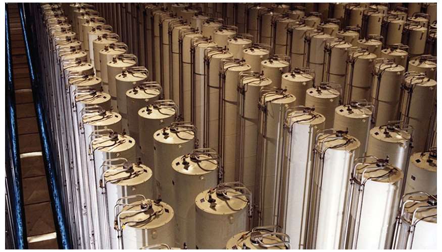 hundreds of tall cylinders arranged pair-wise in rows, photographed from an elevated vantage point