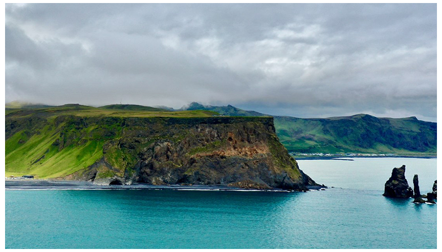 edge of a volcanic island surrounded by water
