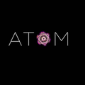 ATOM logo on black background with the O represented by an atomic structure